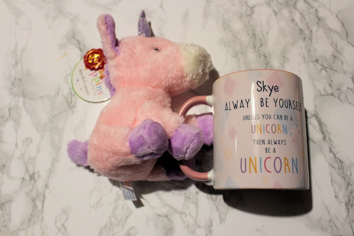 Unicorn teddy holding personalised side of mug
