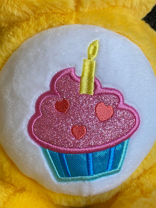Care Bears Birthday Bear cupcake belly image